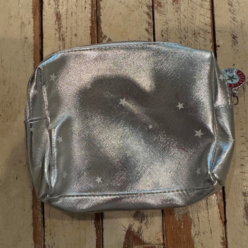 First Aid Beauty FAB Metallic Silver Star Makeup Bag Cosmetic Pouch Red Lining